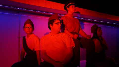 Performers in The House of Illusions.