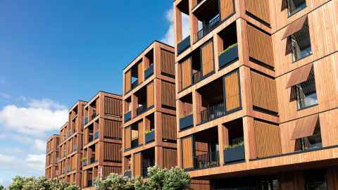 The images shows a row of smart new homes: New Zealand's housing crisis is making already well-off people enormously wealthy and leaving a growing number of families desperately poor. Photo: iStock