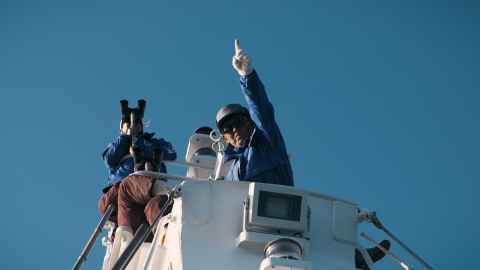 A scene from the documentary 'Ayukawa: The Weight of a Life'. Men aboard a whaling vessel.