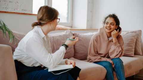 student talking to counsellor