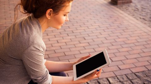 Student with iPad