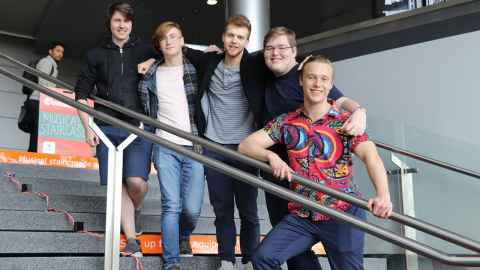 Members of student start-up Shwoop line up on a flight of stairs. Jamie McDonald is on the far right.