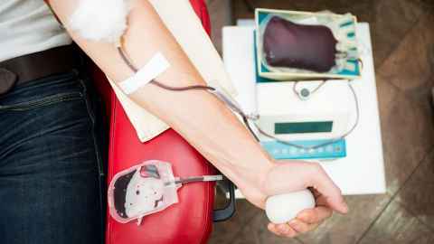 The image shows the arm of a male donating blood: If we can identify low-risk gay men, up to 35,000 more people could donate life-saving blood. Photo: iStock