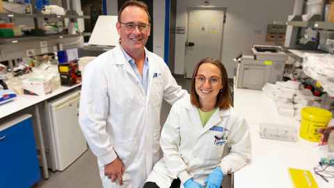 Liggins Professor Justin O'Sullivan and doctoral candidate Sophie Farrow in a lab.
