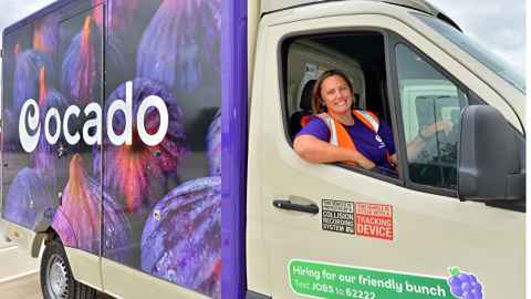 Alumna alumna Melanie (Mel) Smith, CEO of Ocado Retail, inside an Ocado van.