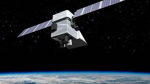 The image shows an satellite - a box-like metal structure with rectangular wings on either side - in orbit above the Earth which is shown in the bottom part of the image.  Image: Ball Aerospace
