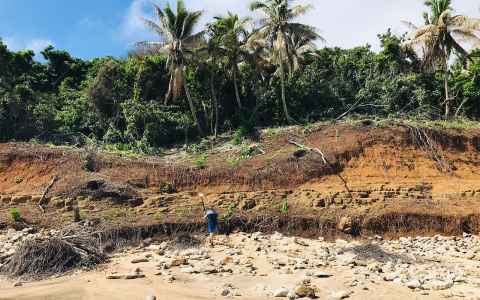 Professor Shane Cronin on Tonumea, in the Ha’apai group of islands next to a 12-metre erosion