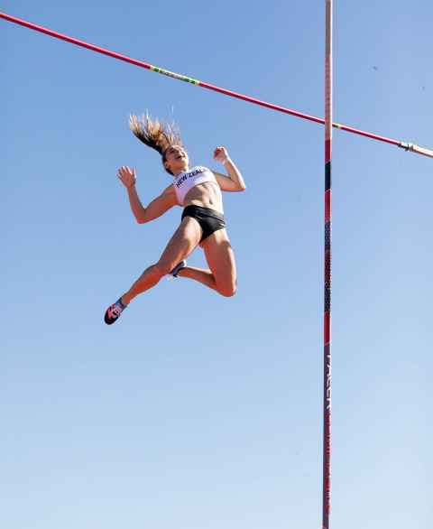 Imogen Ayris has a personal best of 4.5m. Photo shows her pole vaulting. 