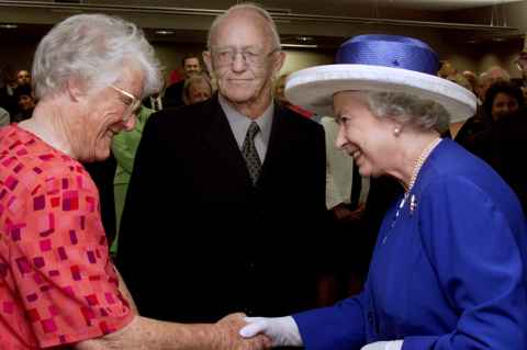 Auckland’s first female obstetrician, the late Lady Celia Liggins, is introduced to Her Majesty, with late Sir Professor Graham (Mont) Liggins at the opening of the Liggins Institute in 2002.
