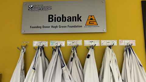 Centre for Brain Research's Biobank, with white lab coats hanging on hooks 