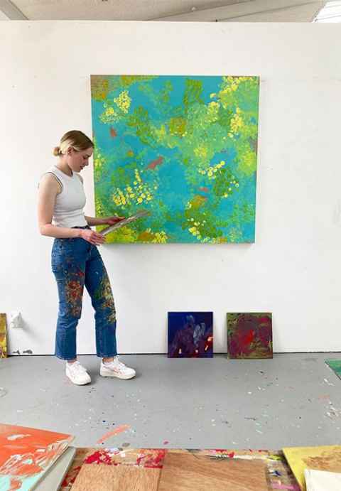 Rosaleen painting in studio