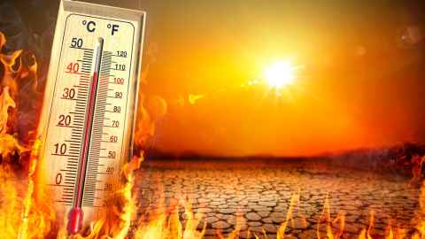 thermometer-of-rising-temperature-fire-background