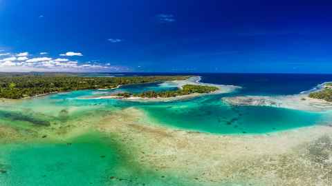 Drone aerial view of Erakor Island, Vanuatu, near Port Vila, and surroundings.