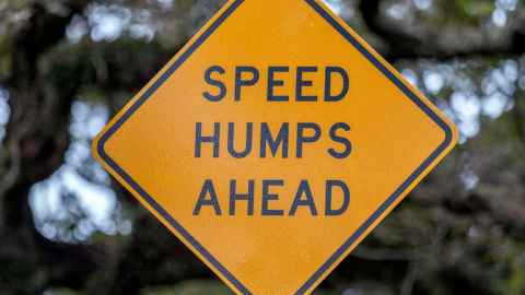 Close up of speed hump sign 