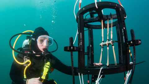 Louise Wilson with a sensor and hydrophones. Photo: Paul Caiger
