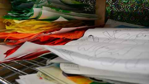 Coloured papers and children' drawings