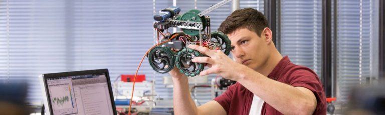A student assessing a motor model